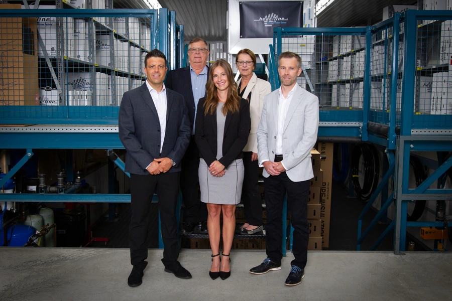 Group photo of Heat-Line's leadership team announcing the 2025 leadership transition, featuring President Matthew Roberts, VP Brent Heise, VP Laura Roberts, VP Robin Heise, and VP Lorne Heise.